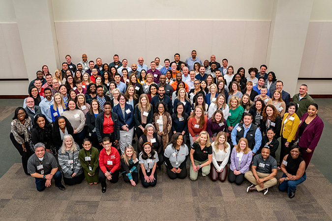 Farmer with the Diversity and Inclusion Summit attendees.