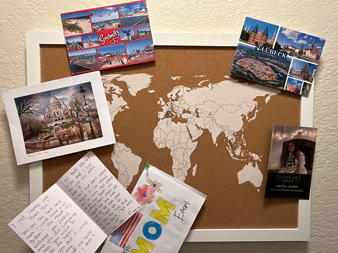 Morgan’s pin board and cards from former exchange students Morgan’s pin board and cards from former exchange students