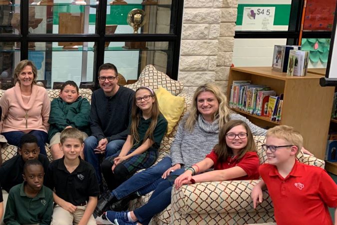 BNSF team members Susan Green, Jason Lamers and Andrea Power visit with children at Happy Hill Farm Academy in 2019. BNSF team members Susan Green, Jason Lamers and Andrea Power visit with children at Happy Hill Farm Academy in 2019.