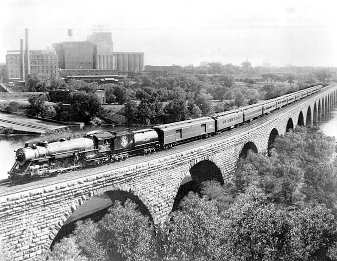 Great Northern’s Empire Builder crossing the stone arch bridge in Minneapolis, Minnesota, in 1929.